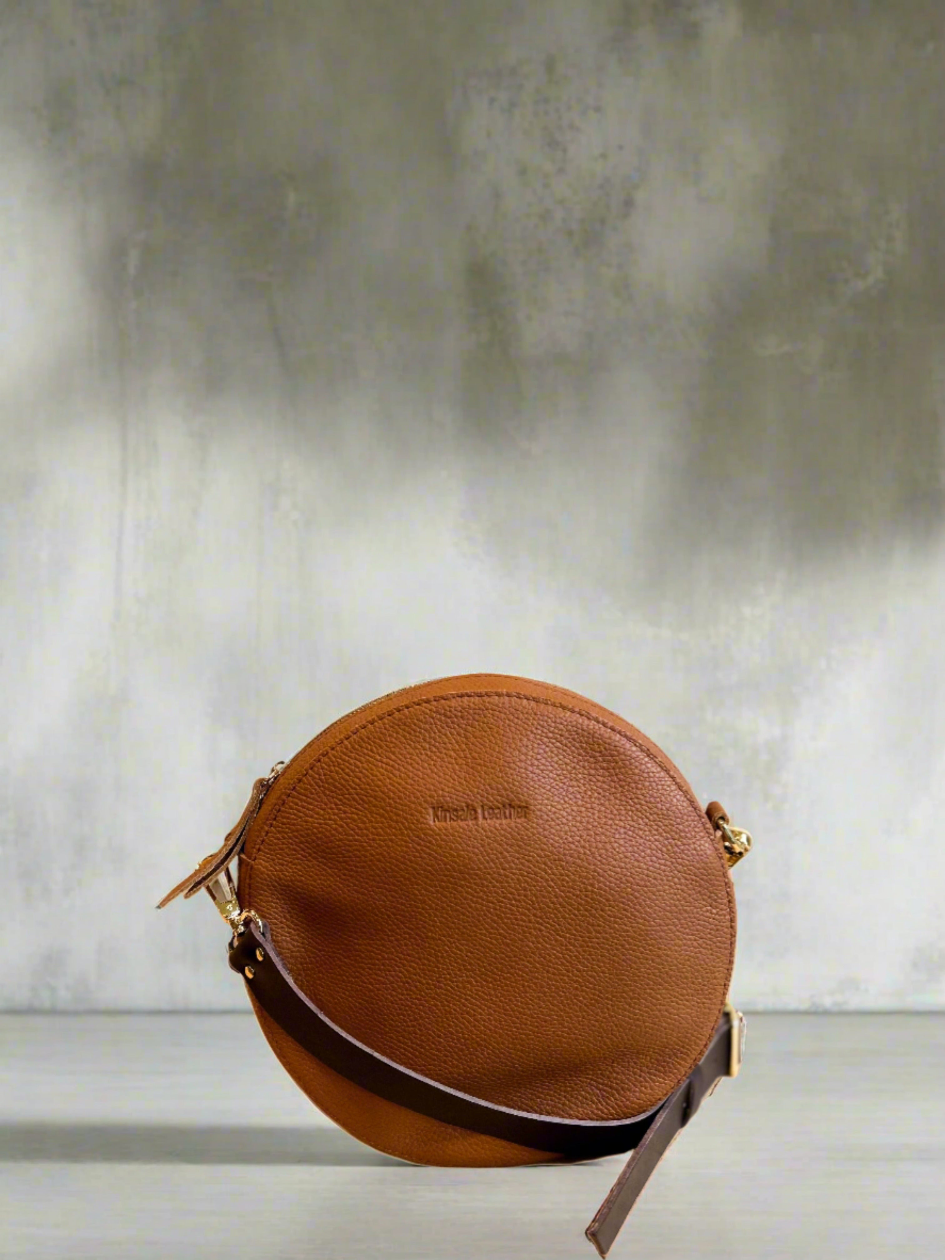 Brown round crossbody bag best sale